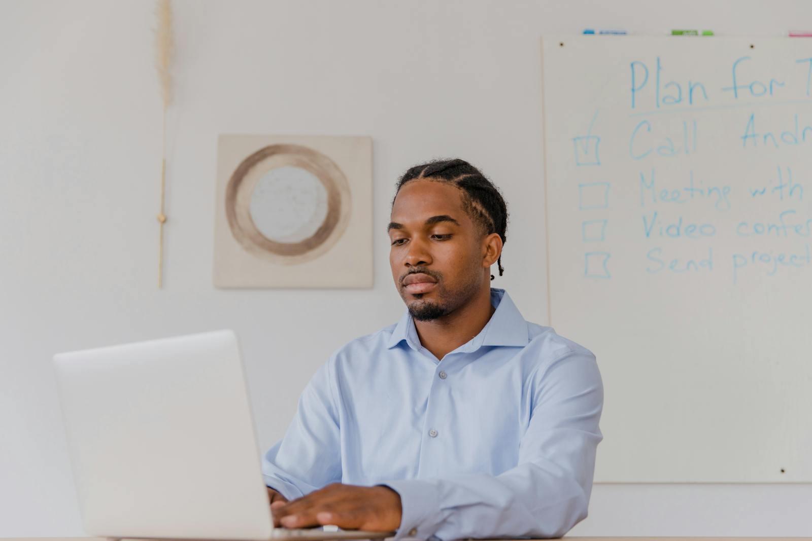 Business owner reviewing business credit readiness notes from a laptop
