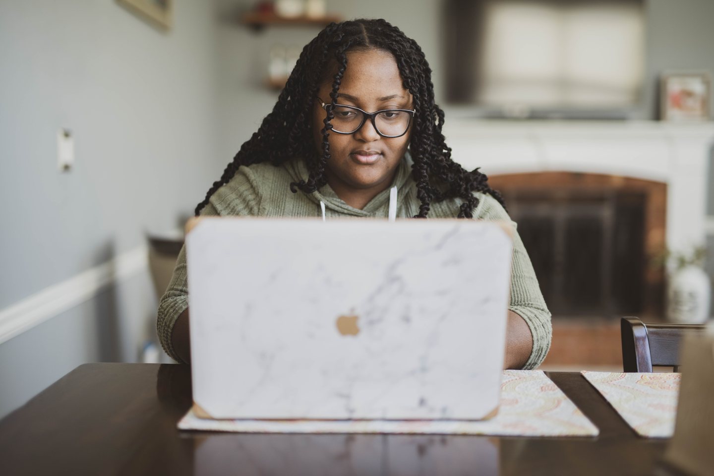 Customer reviewing AI-powered credit repair progress on a laptop
