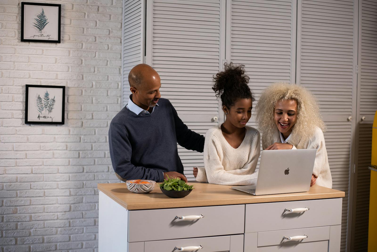 Family reviewing credit progress and next steps together at home